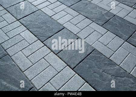 city rectangular gray paving tiles close up Stock Photo