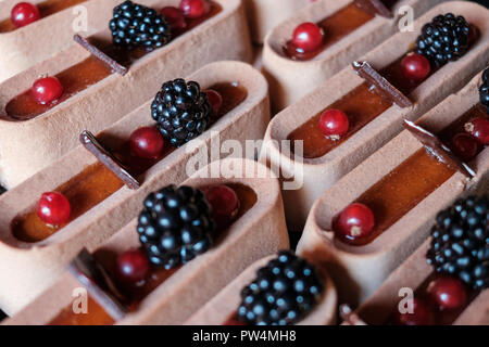 sweet tart cake pieces on dessert buffet  - Stock Photo