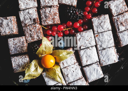 cake pieces and fruits decorated on dessert buffet Stock Photo