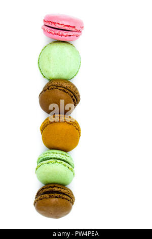 macarons isolated on white background, sweet colorful macarons in row Stock Photo