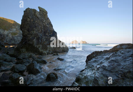 Sea Stack on the beach at Holywell Bay in North Cornwall Stock Photo