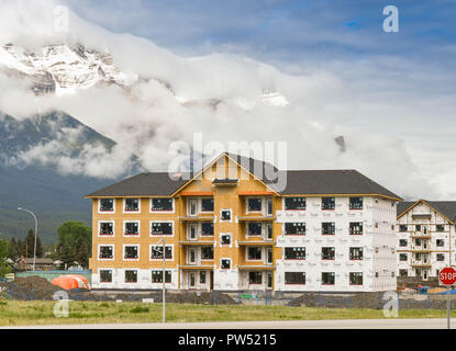 CANMORE, AB, CANADA - JUNE 2018: New apartments being built in Canmore near Banff. Stock Photo