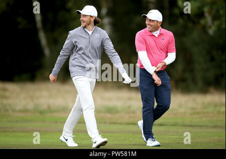 Tommy Fleetwood (left) and Francesco Molinari during day two of the British Masters at Walton Heath Golf Club, Surrey. Stock Photo