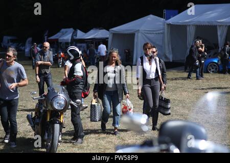 Female Bikers arriving at Château de Neuville in Gambais (78) – France. Stock Photo