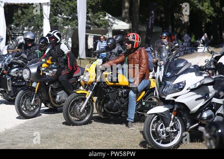 Triumph Thunderbird (yellow) & Thruxton R (grey) arrive at Château de Neuville in Gambais (78) – France. Stock Photo