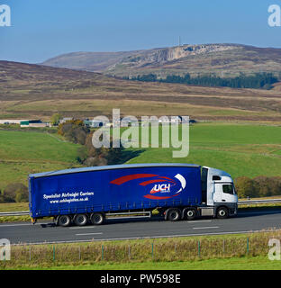 UCH Logistics HGV. Specialist Airfreight Carriers. M6 Northbound carriageway, Shap, Cumbria, England, United Kingdom, Europe. Stock Photo