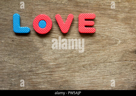 Wording love place on wooden background for valentine Stock Photo