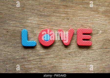 Wording love place on wooden background for valentine Stock Photo