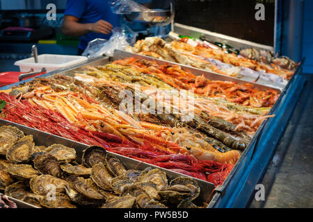 fresh  shrimps, crabs and seafood on ice at fish market stand - Stock Photo