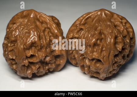 Heap of walnuts, isolated on white background Stock Photo