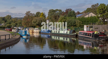 Barges on the Leeds Liverpool Canal at the top of the Five Rise Locks at Bingley, West Yorkshire. Stock Photo