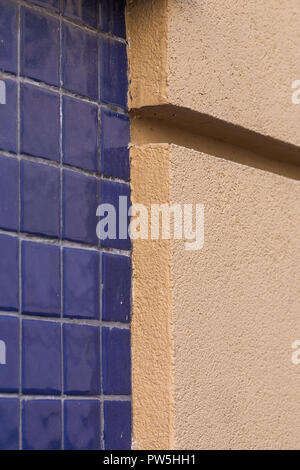 Facade plaster background. Single-ply monolithic plaster decorative background. Single layer scraped cement plaster wallpaper. Exterior building struc Stock Photo