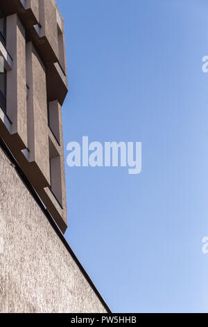 Facade plaster background. Single-ply monolithic plaster decorative background. Single layer scraped cement plaster wallpaper. Exterior building struc Stock Photo