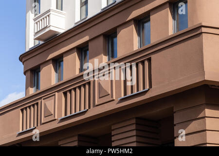 Facade plaster background. Single-ply monolithic plaster decorative background. Single layer scraped cement plaster wallpaper. Exterior building struc Stock Photo