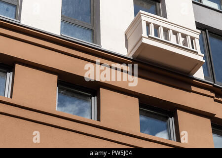 Facade plaster background. Single-ply monolithic plaster decorative background. Single layer scraped cement plaster wallpaper. Exterior building struc Stock Photo