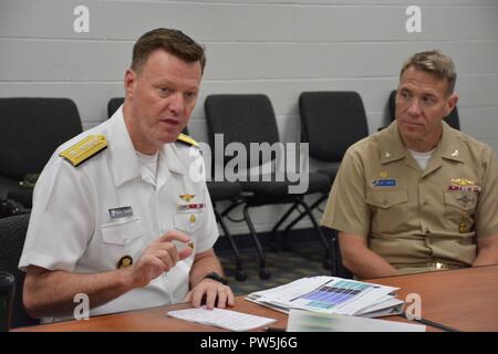 PENSACOLA, Fla. -- Commander, Naval Education and Training Command (NETC) Rear Adm. Kyle Cozad speaks to NETC domain commanding officers, executive directors and technology specialists during the 'Big Six' Innovative Technology Workshop Sept. 21 at the Center for Naval Aviation Technical Training (CNATT) headquarters aboard Naval Air Station Pensacola, Florida. CNATT hosted the day-long workshop during which NETC domain leadership discussed leveraging technology to further education. Stock Photo