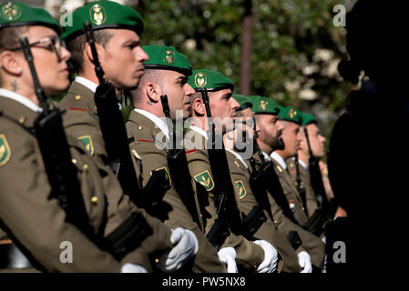 Members of military forces in Granada seen before the military parade during the National Day. In Spain each October 12th is celebrated the Hispanic Day, this festivity commemorates the arrival of Christopher Colombus to América. Stock Photo