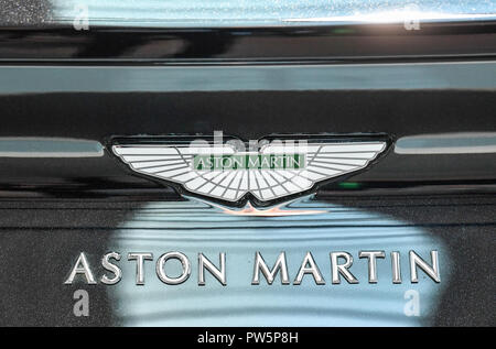 FILED - 25 April 2018, Berlin: 25 April 2018, Germany, Berlin: The logo of the British sports car manufacturer Aston Martin, taken at a press event at the Aston Martin Motor Show.  Aston Martin will replace Mercedes as the third manufacturer in the German Touring Car Masters in the coming season. (to dpa-message: 'Aston Martin enters DTM 2019' from 11.10.2018) Photo: Jens Kalaene/dpa-Zentralbild/dpa Stock Photo