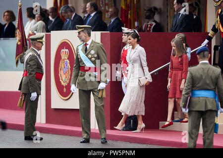 King Felipe VI of Spain, Queen Letizia of Spain, Princess Leonor of Spain and Princess Sofia of Spain attends to Spanish National Day military parade in Madrid. The Spanish royal family attended the annual national day military parade held in the Capital city. Thousand of soldiers has taken part in the parade. Stock Photo