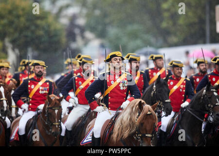 Members of the military seen dress up in traditional uniform during the Spanish National Day military parade in Madrid. The Spanish royal family attended the annual national day military parade held in the Capital city. Thousand of soldiers has taken part in the parade. Stock Photo