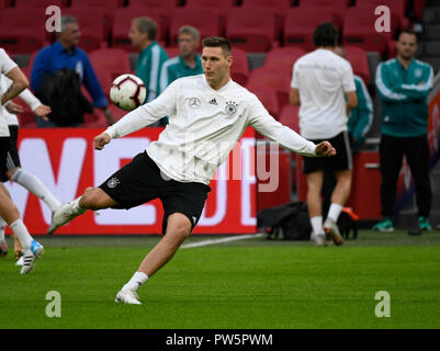 Amsterdam, Netherlands. 21st Apr, 2017. 12 October 2018, The Netherlands, Amsterdam: The national player Niklas Suele during the final training in the Johan-Cruyff-Arena. The national team of Germany will play against the Netherlands in the Nations-League game next Saturday. Credit: Ina Fassbender/dpa/Alamy Live News Stock Photo