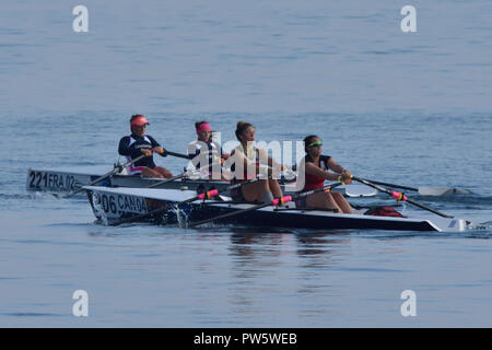 Women's double scull teams pull power as they battle for a qualifying position in the WRCC finals. The crew of Maya and Josephine Cornut-Danjou from Libourne, France led the Canadian crew of Roxanna Dehghan and Michelle Truax by less than a boat length for a 2nd and 3rd finish. Both crews qualified for the 'A' level finals along with the first place finishing crew from Italy. Stock Photo