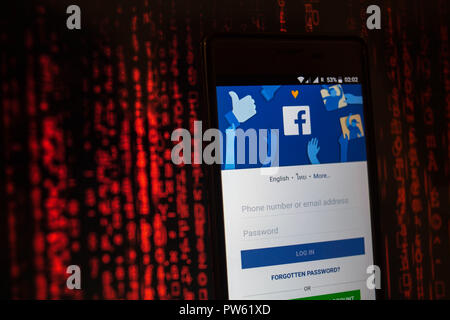 Facebook logo seen displayed on a smartphone Stock Photo - Alamy