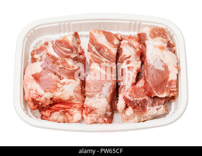 Pork spine bone for soup in biodegradable plastic tray, deep focus stacking image, include pen tool path Stock Photo