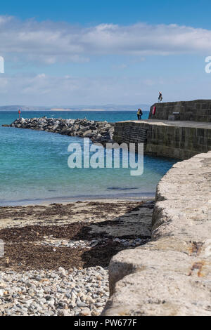 The Cobb in the coastal town of Lyme Regis in Dorset. Stock Photo