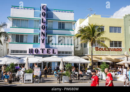 Miami Beach Florida,Ocean Drive,New Year's Day,Colony,hotel,street,sidewalk cafe,restaurant restaurants food dining cafe cafes,umbrellas,al fresco sid Stock Photo