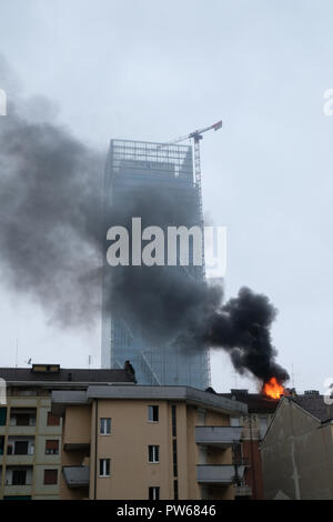 Turin, Italy. 11th Oct, 2018. An attic fire via Genova near the skyscraper of Piedmont region . Credit: Bruno Brizzi/Pacific Press/Alamy Live News Stock Photo