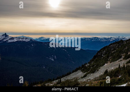 Late Afternoon Sun Over Mountains Stock Photo