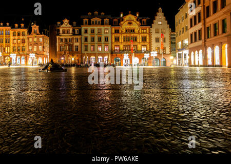 Mainz, Germany, Markt, October 12th. 2018 - Urban night scene with historic building, bars and cafes, cobblestone and people outdoor Stock Photo