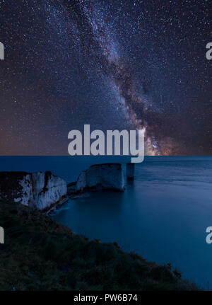 Stunning vibrant Milky Way composite image over landscape of Landscape ...