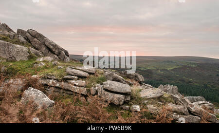 Beautiful Autumn sunset landscape image of view from Leather Tor towards Burrator Reservoir in Dartmoor National Park Stock Photo