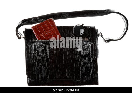 Modern men's briefcase with passport and sunglasses, isolated on white background. Stock Photo