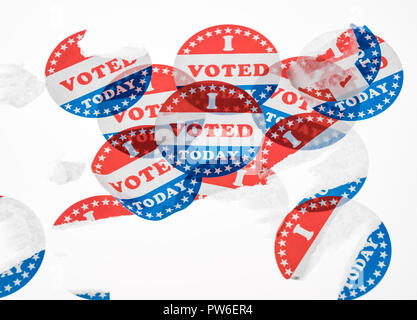 Torn and defaced I Voted Today paper stickers on white background Stock Photo