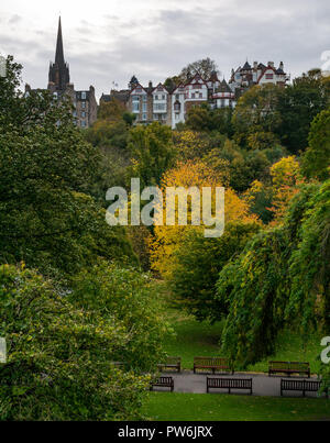 Autumn tree colours with view of Ramsey Gardens on the Royal Mile from Princes Street Gardens, Edinburgh, Scotland, UK Stock Photo