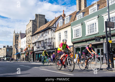 Cambridge, UK -  September 2018. People cycling on the road in Bridge street, Central Cambridge on a summer sunny day. Stock Photo