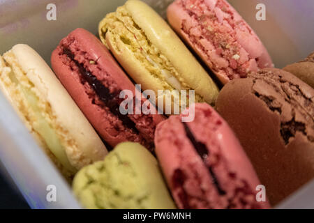 Close up shot of a selection of Macarons or French Macaroons from Parisian Pastry Shop Stock Photo