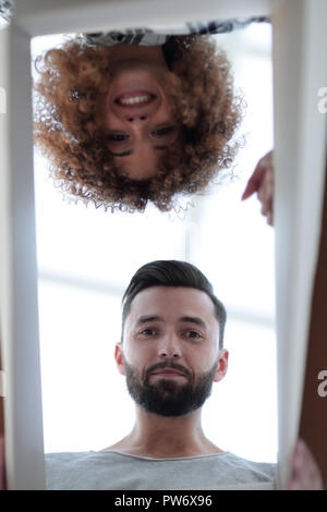 View from the bottom of the newlyweds looking inside the box. Stock Photo