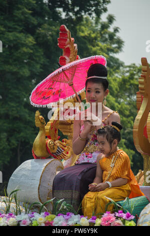 Chiang Rai, Thailand - April 13, 2018: Songkran festival at Suan Tung Lae Khom Chiang Rai Park in Chiang Rai. The girl is crowned to be Miss Songkran. Stock Photo