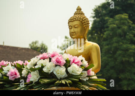 Chiang Rai, Thailand - April 13, 2018 : Songkran festival at Suan Tung Lae Khom Chiang Rai Park in Chiang Rai. Buddha image. Stock Photo