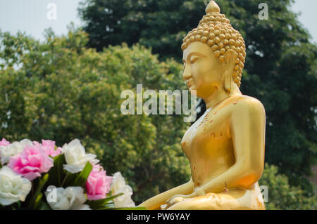 Chiang Rai, Thailand - April 13, 2018 : Songkran festival at Suan Tung Lae Khom Chiang Rai Park in Chiang Rai. Buddha image. Stock Photo