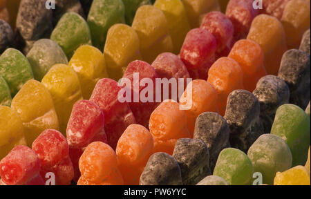 Jelly babies lined up in a row Stock Photo