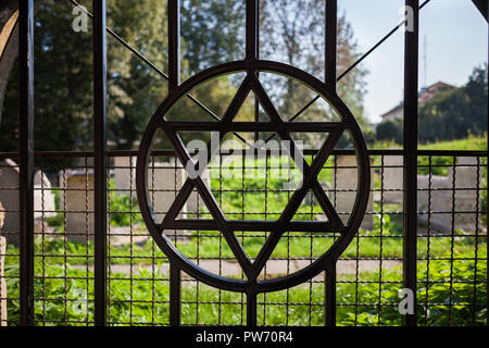 Star of David symbol on cemetary fence in Jewish Quarter of Kazimierz in Krakow, Poland