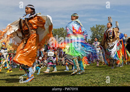 BISMARK, NORTH DAKOTA, September 8, 2018 : Women dancers of the 49th annual United Tribes Pow Wow, one large outdoor event that gathers more than 900  Stock Photo