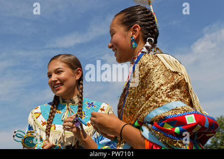 BISMARK, NORTH DAKOTA, September 8, 2018 : Women dancers of the 49th annual United Tribes Pow Wow, one large outdoor event that gathers more than 900  Stock Photo