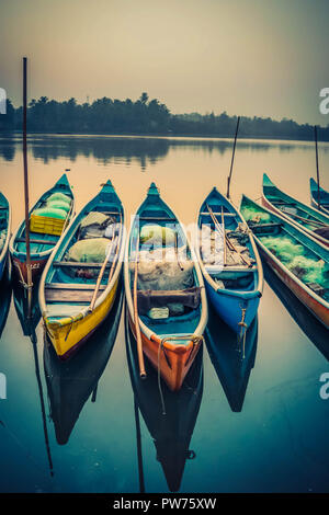 Wooden boats on river water Stock Photo - Alamy