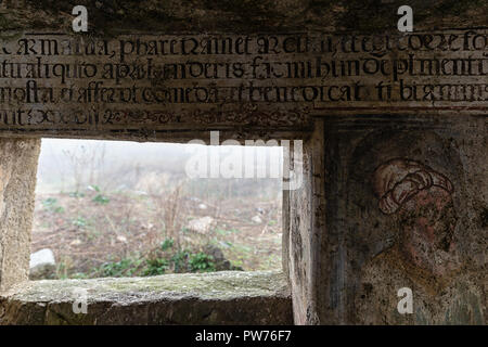 Caceres, Spain. - February 18, 2018: Frescoes and paintings very deteriorated in the ruins of the old hermitage of San Jorge. Caceres. Extremadura. Sp Stock Photo